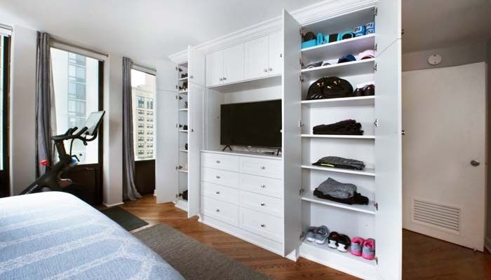 Armoire de rangement en bois pour meubles de chambre à coucher dans un appartement d'hôtel